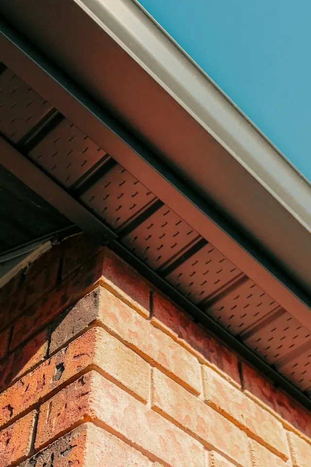 Recently cleaned fascia, soffit, and downpipe